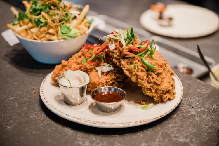 Fried chicken and fries from Malcom Yards.